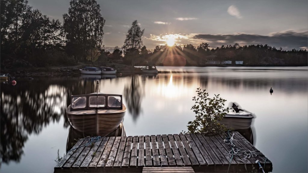 Brygge og båt ved Moss, fra meglergaarden.no